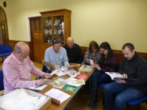 The project group look at Braintree District Museum's World War I archive. Left to Right - Carl, Tony Morrison (Essex-on-Tour & Last Poppy Co-Ordinator), Mike, Jackie, Hannah and Chris 