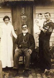 Ada Carter (nee Bewers), William Bewers and William John Cornelius Bewers carrying Queenie Carter, 1911.