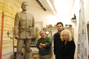 The statue in November 2013 with the sculptor John Doubleday (left) Will Columbine, Herbert’s great nephew (centre) and Carole McEntee-Taylor.